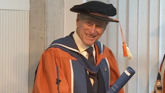 The Duke jokes as he receives his doctorate