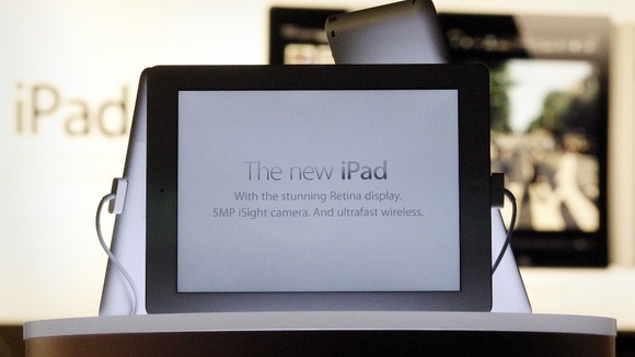 New iPad tablets are seen in a window display in an Apple store in Sydney