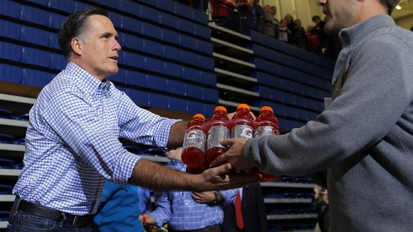 US Republican presidential nominee Romney accepts relief supplies for people affected by the storm in Kettering, Ohio