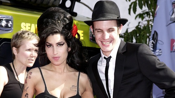 Amy Winehouse and her husband Blake Fielder-Civil arrive for the 2007 MTV Movie awards in Los Angeles.