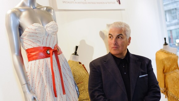 Mitch Winehouse with a dress by Disaya which Amy Winehouse wore on the cover of her Back to Black album cover.