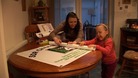 Ria Stonehouse, who has had the surgery, preparing banners with her mum Michelle.