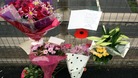 Flowers and tributes left on a bridge overlooking the M5 at Taunton, Somerset.