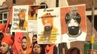 People holding banners at today's protest in Birmingham