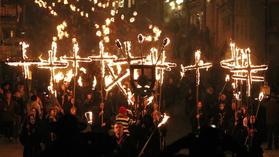 Residents of Lewes walk through the town centre