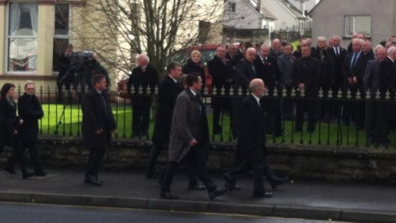 Justice Minister, David Ford, arrives for funeral service