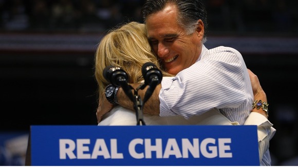 Mitt Romney hugs his wife Ann at the final rally of the campaign