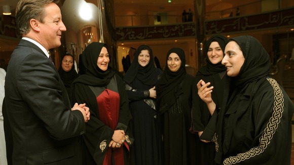 Prime Minister David Cameron meets female students at Dar Al-Hekma University in Jeddah