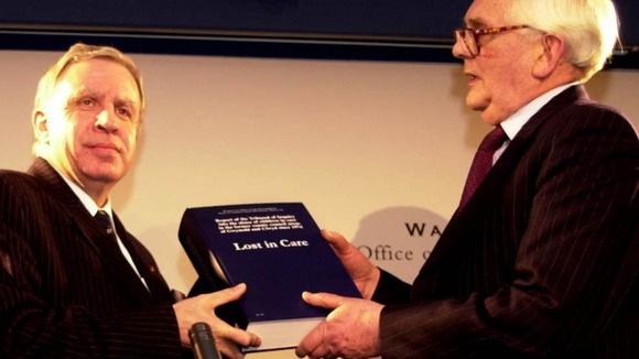 Sir Ronald Waterhouse presents his report to the then Welsh Secretary, Paul Murphy, in February 2000