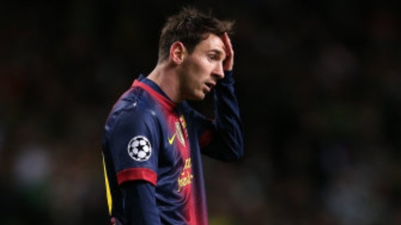 Barcelona's Lionel Messi stands dejected