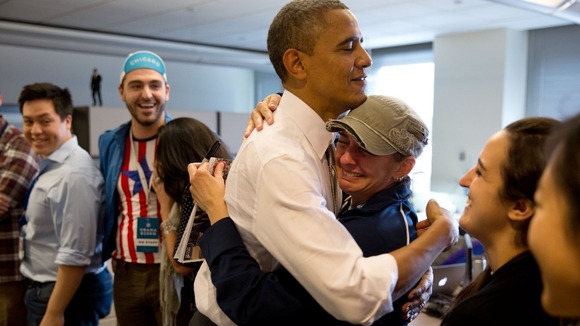 The U.S President greets staff at his campaign headquarters in Illinois.