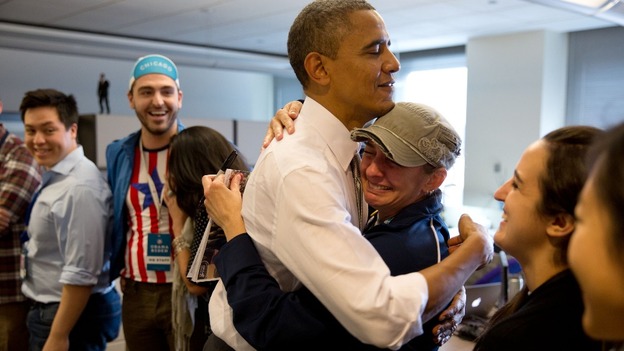 The U.S President greets staff at his campaign headquarters in Illinois.
