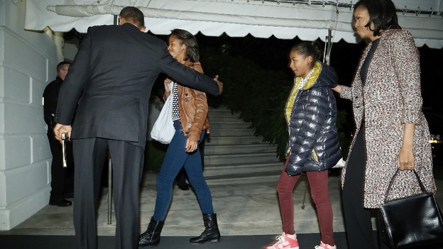President Obama and his family on arrival in Washington.