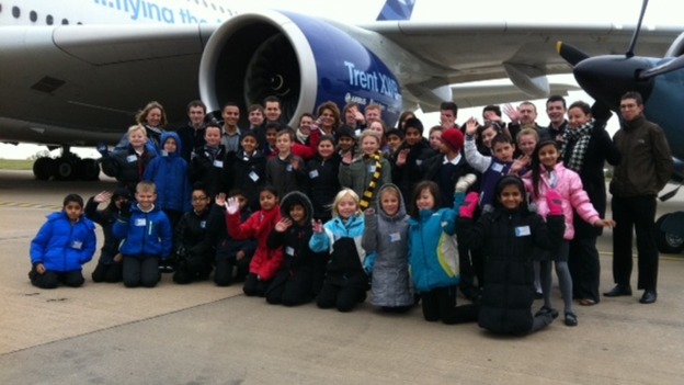 This large party of schoolchildren is overshadowed by the Airbus A380