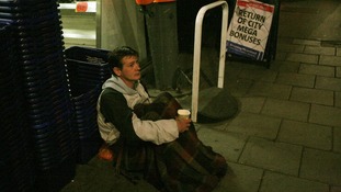 Homeless man outside Royal Festival Hall, South Bank Centre, London.