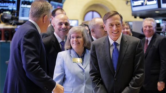 Former Central Intelligence Agency Director David Petraeus (right) pictured with his wife Holly at the New York Stock Exchange.