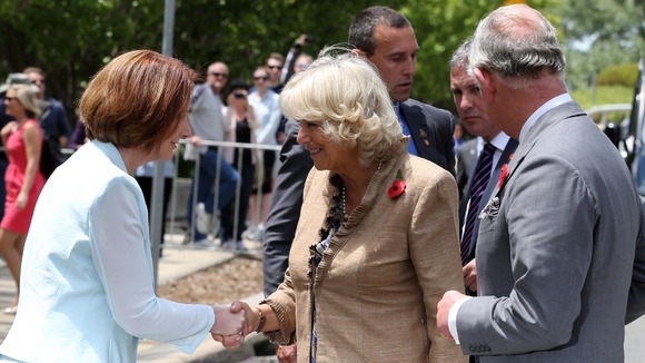 Australia's Prime Minister Julia Gillard greeting Camilla and Charles at an unveiling ceremony in honour of the Queen in Canberra Australia.