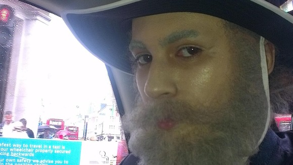 Miles Alura disguised as an old man, in a photo issued by the Metropolitan Police.