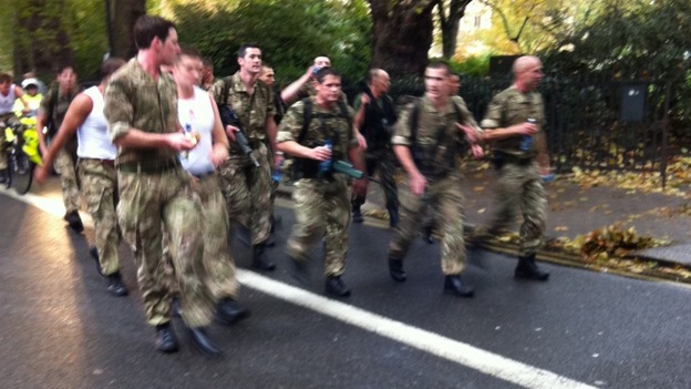 Royal Marines during their marathon speed-march in London today.