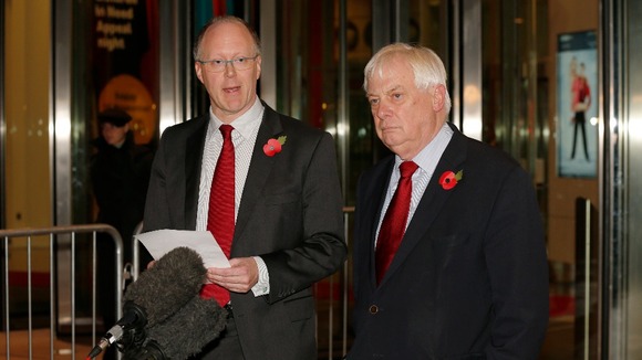 BBC director general George Entwistle (left) looks on as Chairman of the BBC Trust Lord Patten speaks to the media.