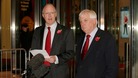 BBC director general George Entwistle (left) looks on as Chairman of the BBC Trust Lord Patten speaks to the media.