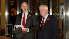 BBC director general George Entwistle (left) looks on as Chairman of the BBC Trust Lord Patten speaks to the media.
