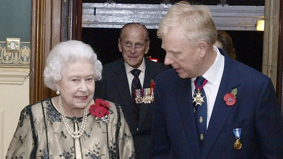 The Queen is greeted by the President of the Royal British Legion Vice-Admiral Peter Wilkinson.