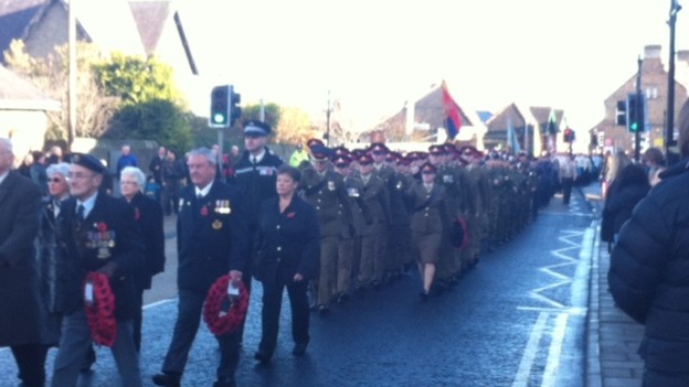 People line the streets to remember the lives lost at war