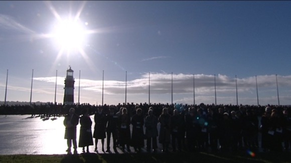 Thousands pay their respects