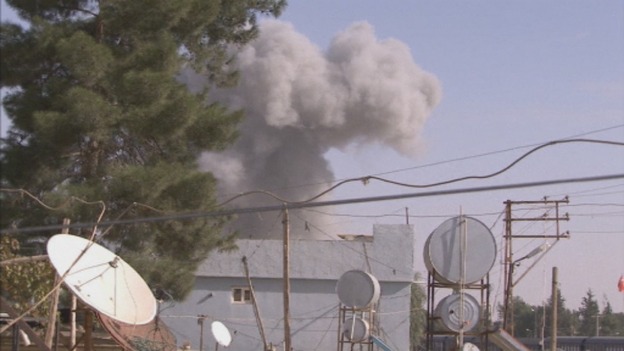 Aftermath of Syrian jet attack on border town