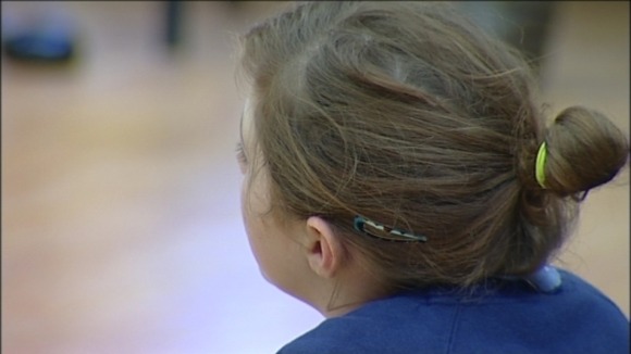 A primary school pupil listens to what the Childline Volunteers have to say