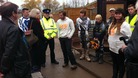 Home Secretary Theresa May meets young people who are taught riding skills and first aid at the project