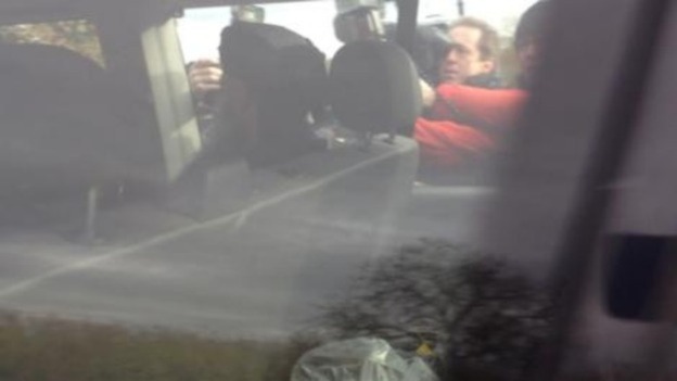 Photographers jockey for the first photo of Abu Qatada following his jail release.