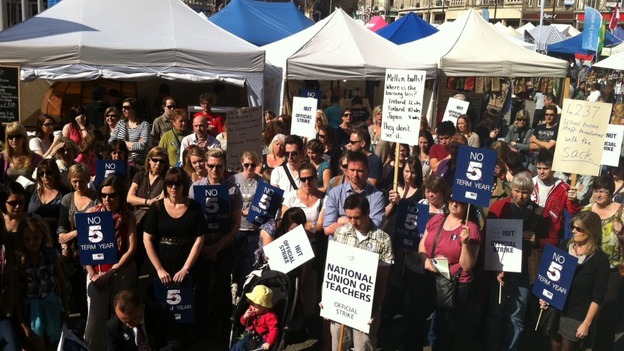Teachers from schools across the city protesting about changes to the school year