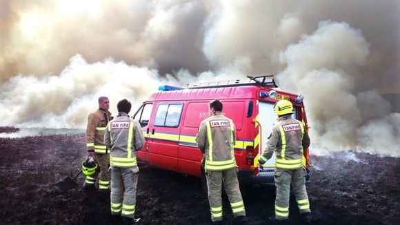 South Wales Fire and Rescue Service fighting grass fires