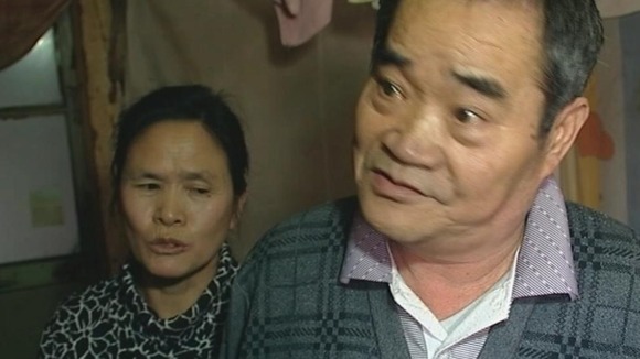 Long Li Hua and her husband Zhang Xingjian say 'we don't have human rights'
