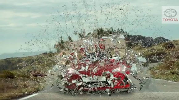 The ad featured the car bursting through a barrier
