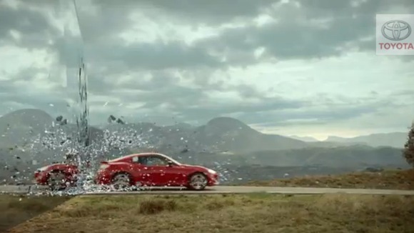 The ad featured the car bursting through a barrier