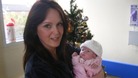 Paula Stevenson holding her daughter, Hayley Fullerton who died at Birmingham Children's Hospital one month after her first birthday
