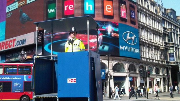 An officer uses special podium to monitor crowds in the West End.