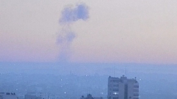A plume of smoke rises over the view of the Gaza Israeli border this morning