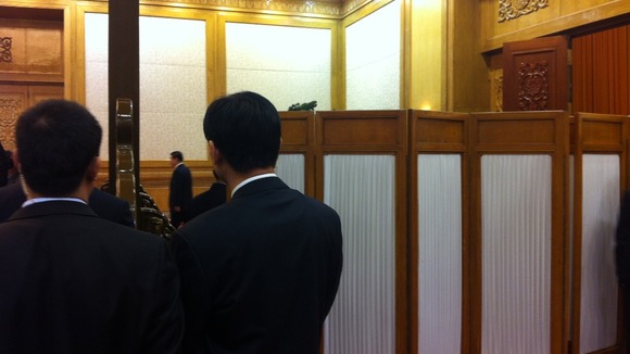 The moment Xi Jinping was just about to walk out from behind a screen to face the world for the first time as the new leader of China