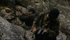 Rebel fighters who have retreated out of Homs on the border with Syria