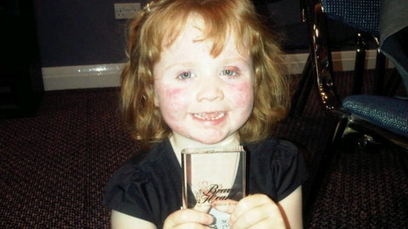 Five year old Sophia Evans with her award.