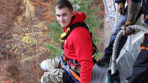 Private Scott Meenagh, who lost both his legs while on duty in Afghanistan last year, completes a 40-metre bungee jump in Scotland.