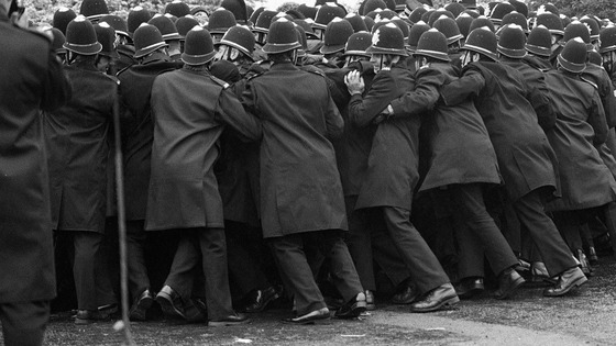 Police pushing against a section of the miners' picket outside the Orgreave Coking Plant near Rotheram in 1984.