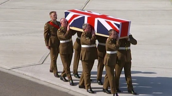 Comrades from the Second Battalion the Mercian Regiment carry Captain Rupert Bowers' coffin
