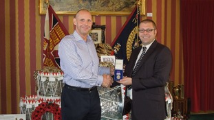 Stan Bates (left) reunites Mick France with his missing medal