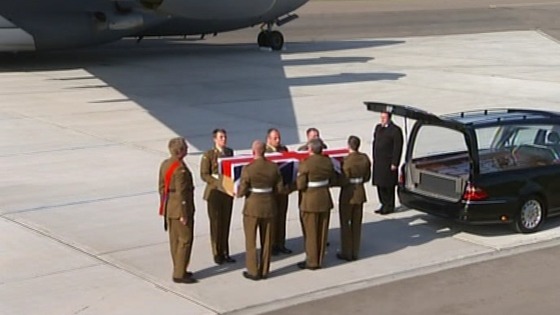 Comrades from the Second Battalion the Mercian Regiment put Captain Rupert Bowers' coffin in hearse