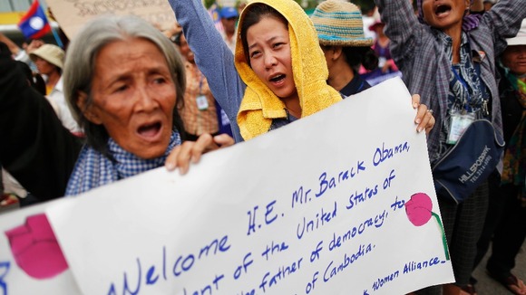 Hundreds of protesters calling for human rights gather in front of Cambodia's National Assembly building